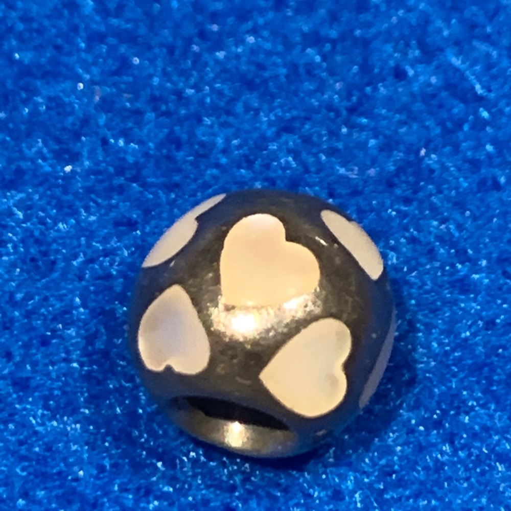 Authentic Pandora white hearts charm